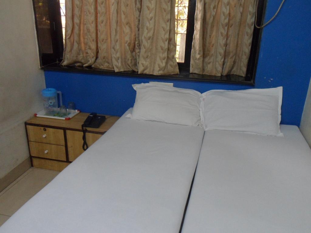 Hotel Happyland Mumbai Bilik gambar